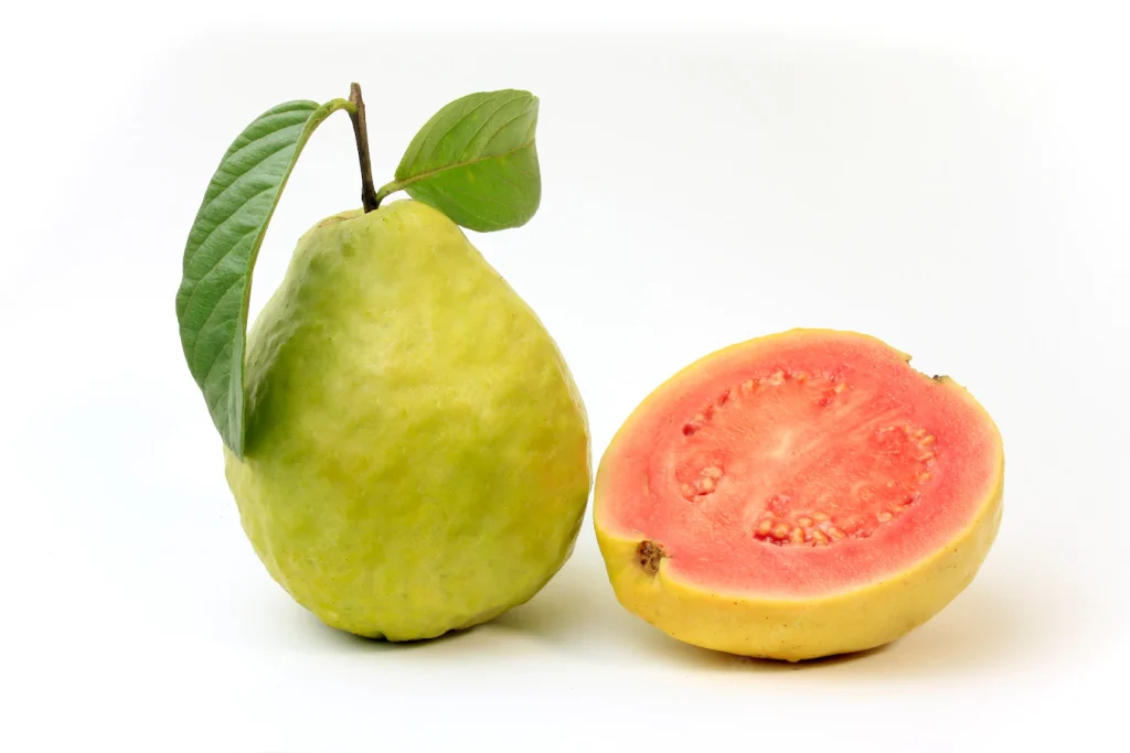 close-up-guava-fruit-pink-fresh-organic-with-leaves-whole-sliced-isolated-white-background-front-view_59529-234