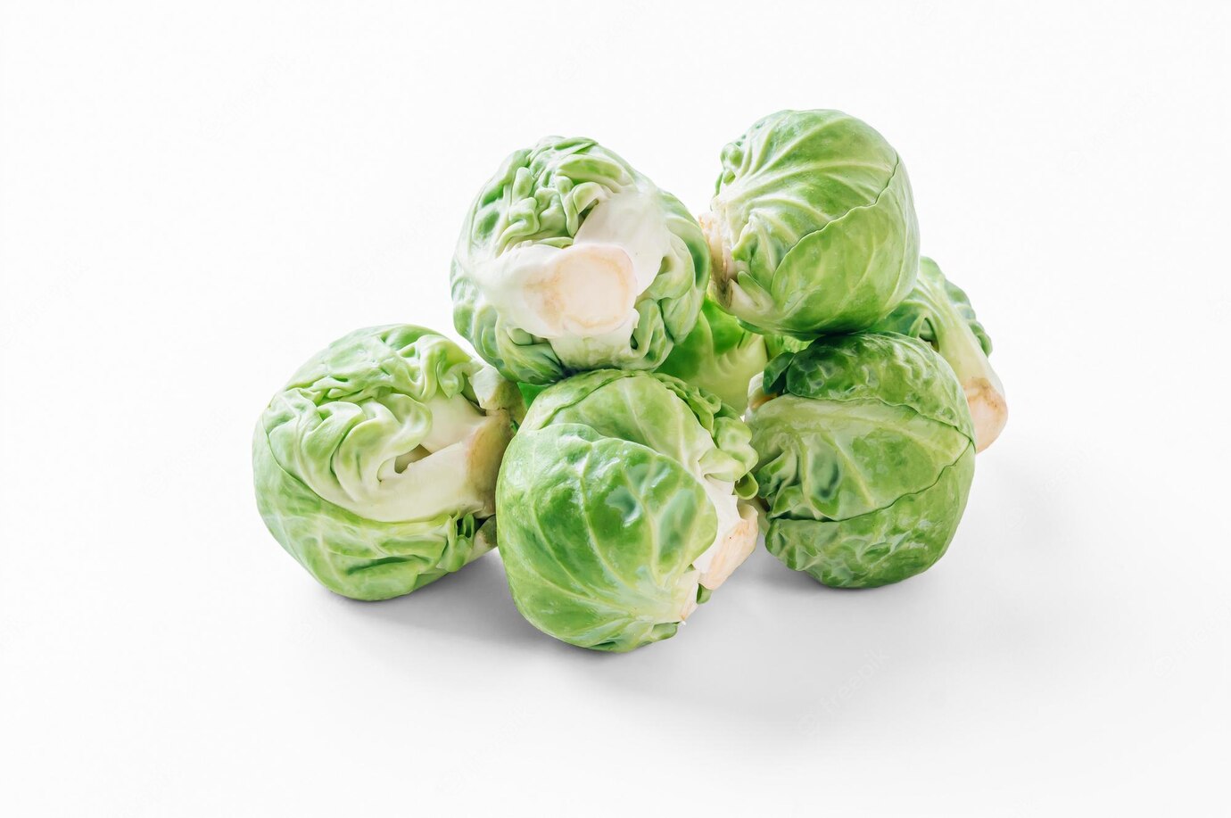 fresh-green-brussel-sprouts-vegetable-white-background_259258-1526